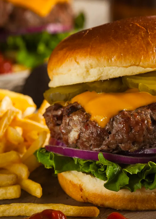 Cheeseburger with fries.